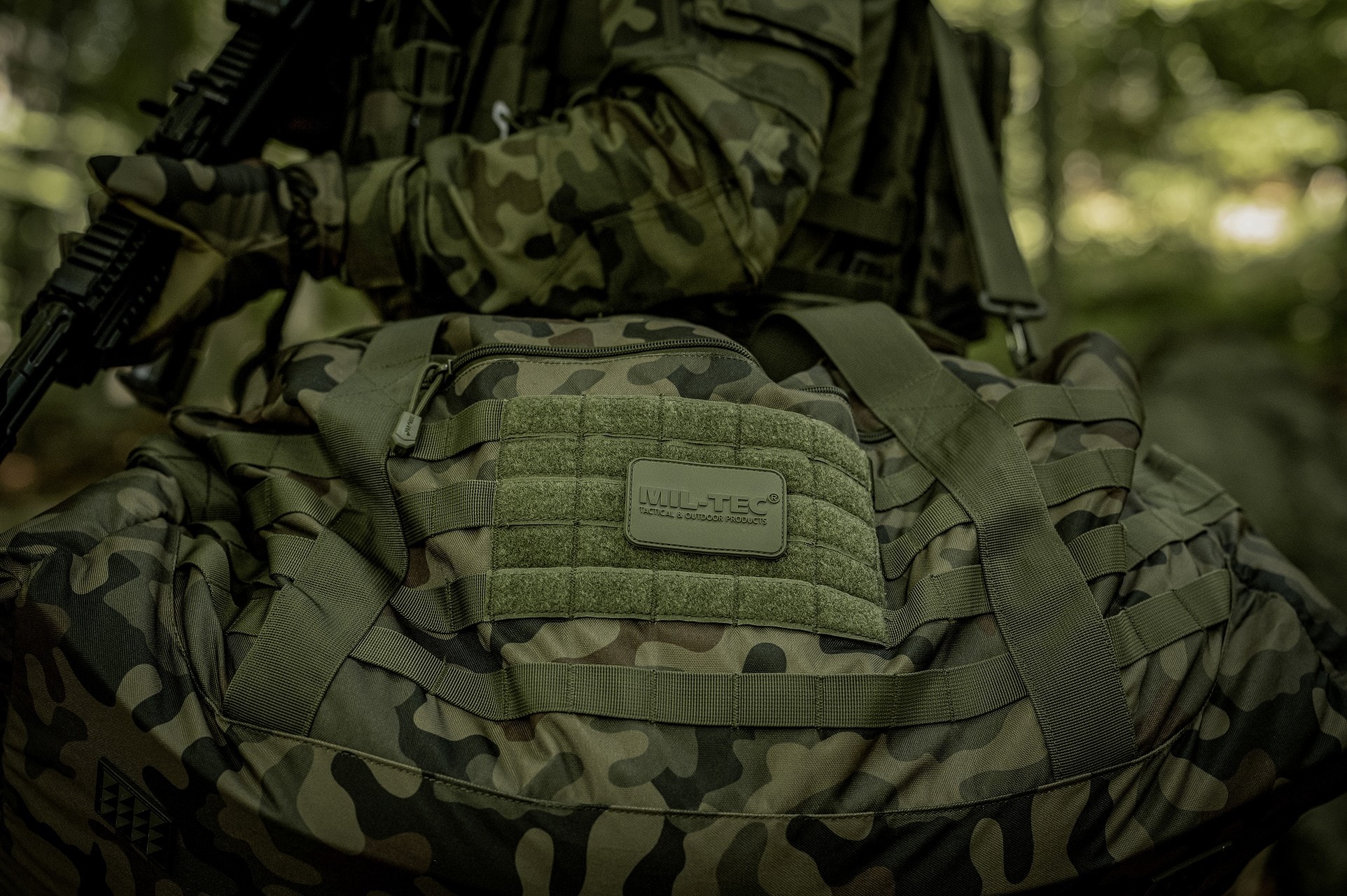 Taška Mil-Tec US Combat Parachute Cargo Large 105 l - wz. 93 Pantera PL Woodland