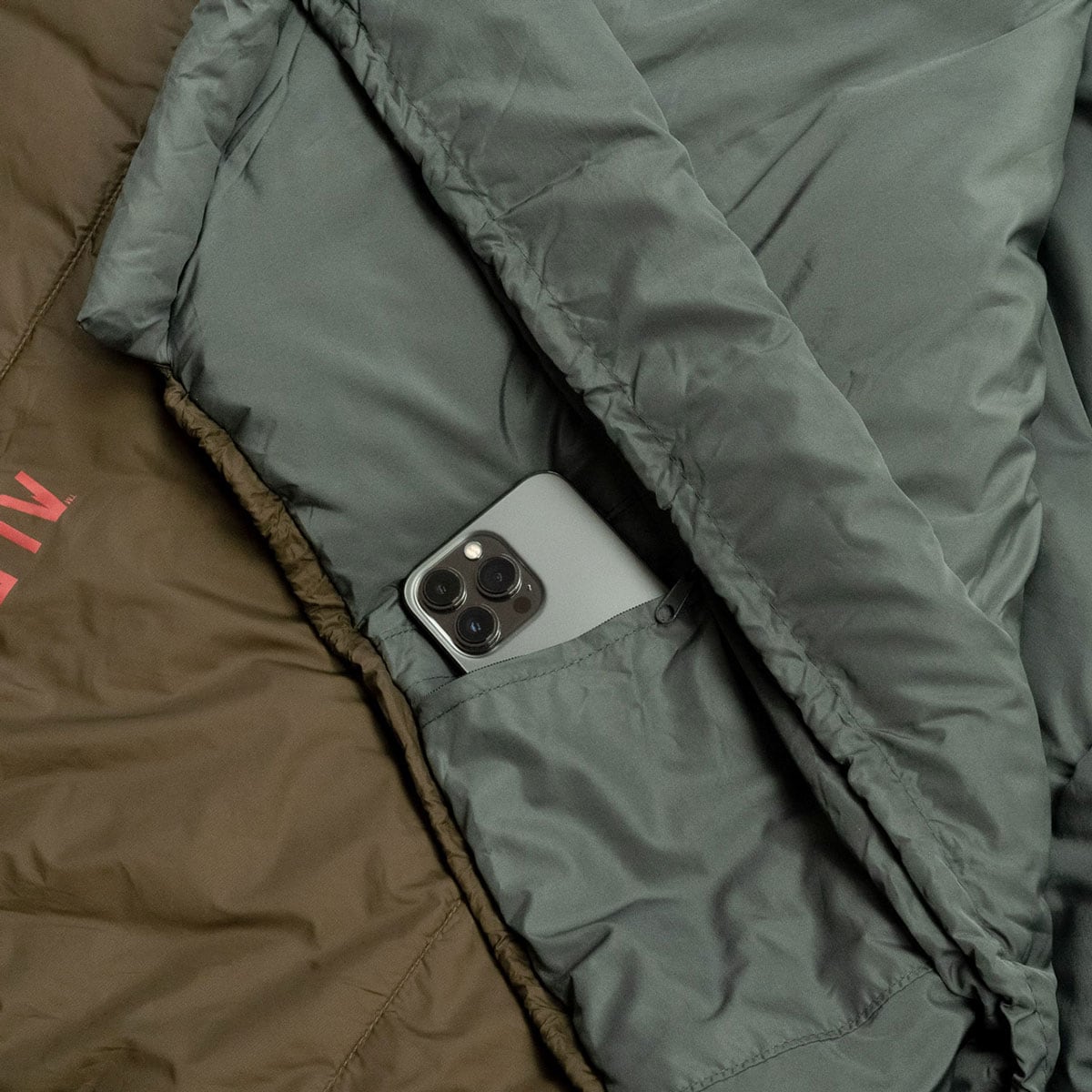 Alpinus Survival 1300 Sleeping Bag left - Khaki