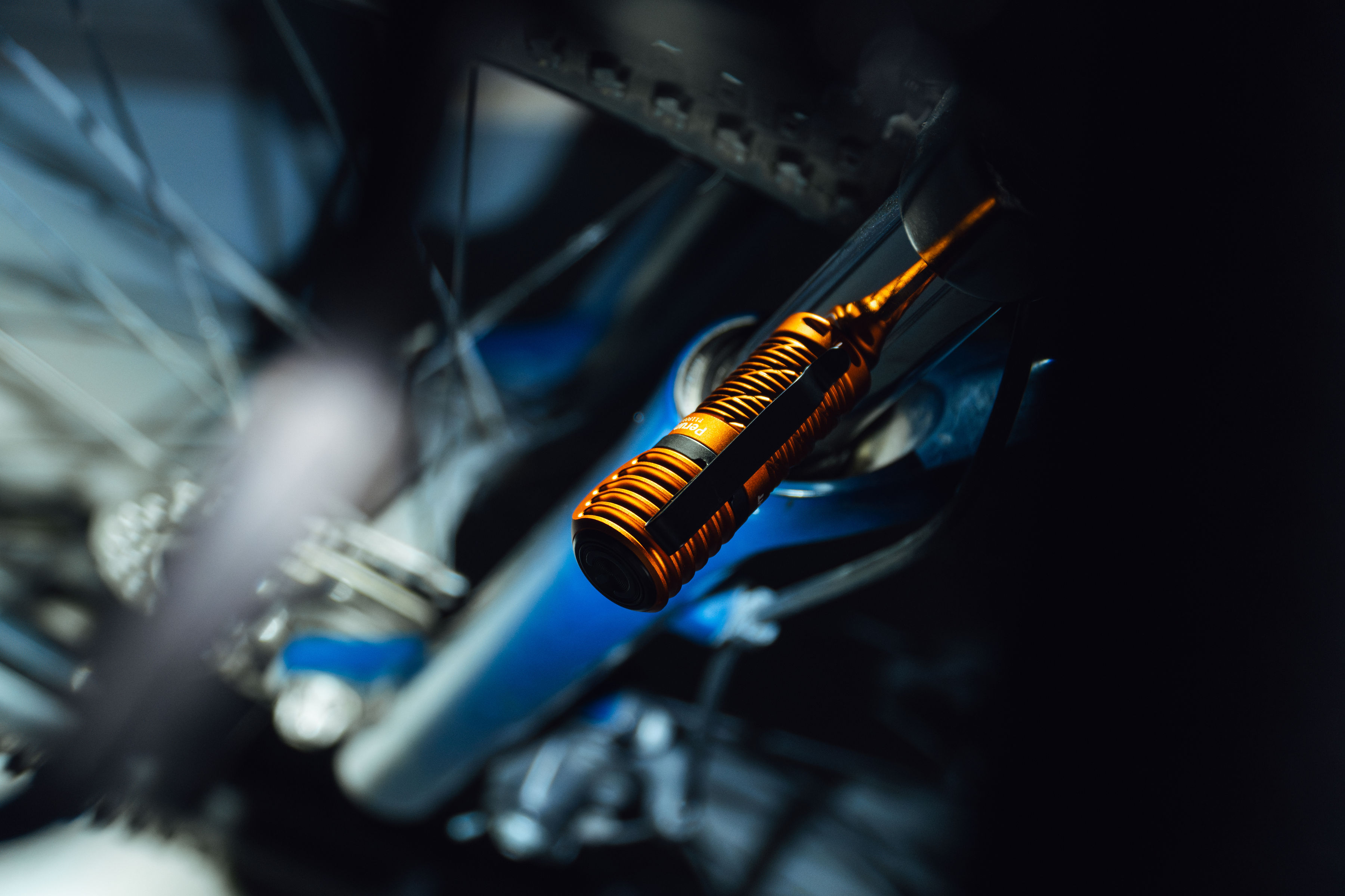 Olight Perun 3 Mini Cool White Orange Head Torch with Angled Torch with Headband - 1250 lumens