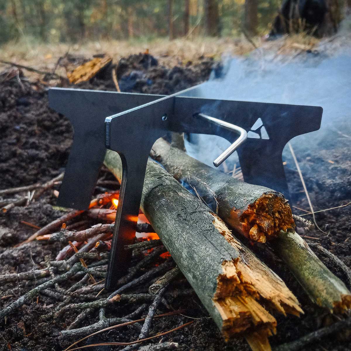 Socle de cuisson pour feu de camp 