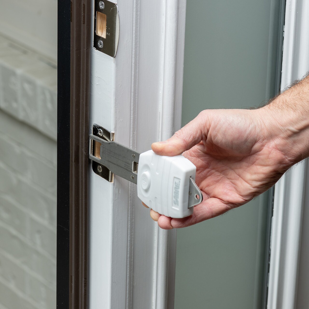 Blocco universale per porte Sabre - White