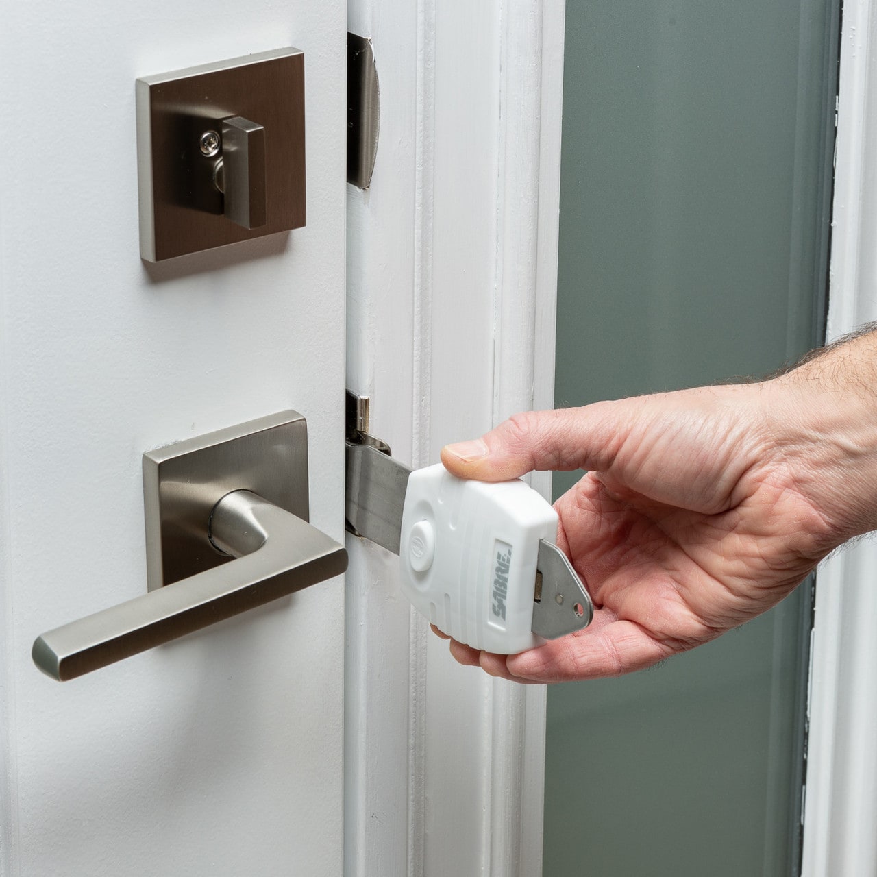 Blocco universale per porte Sabre - White