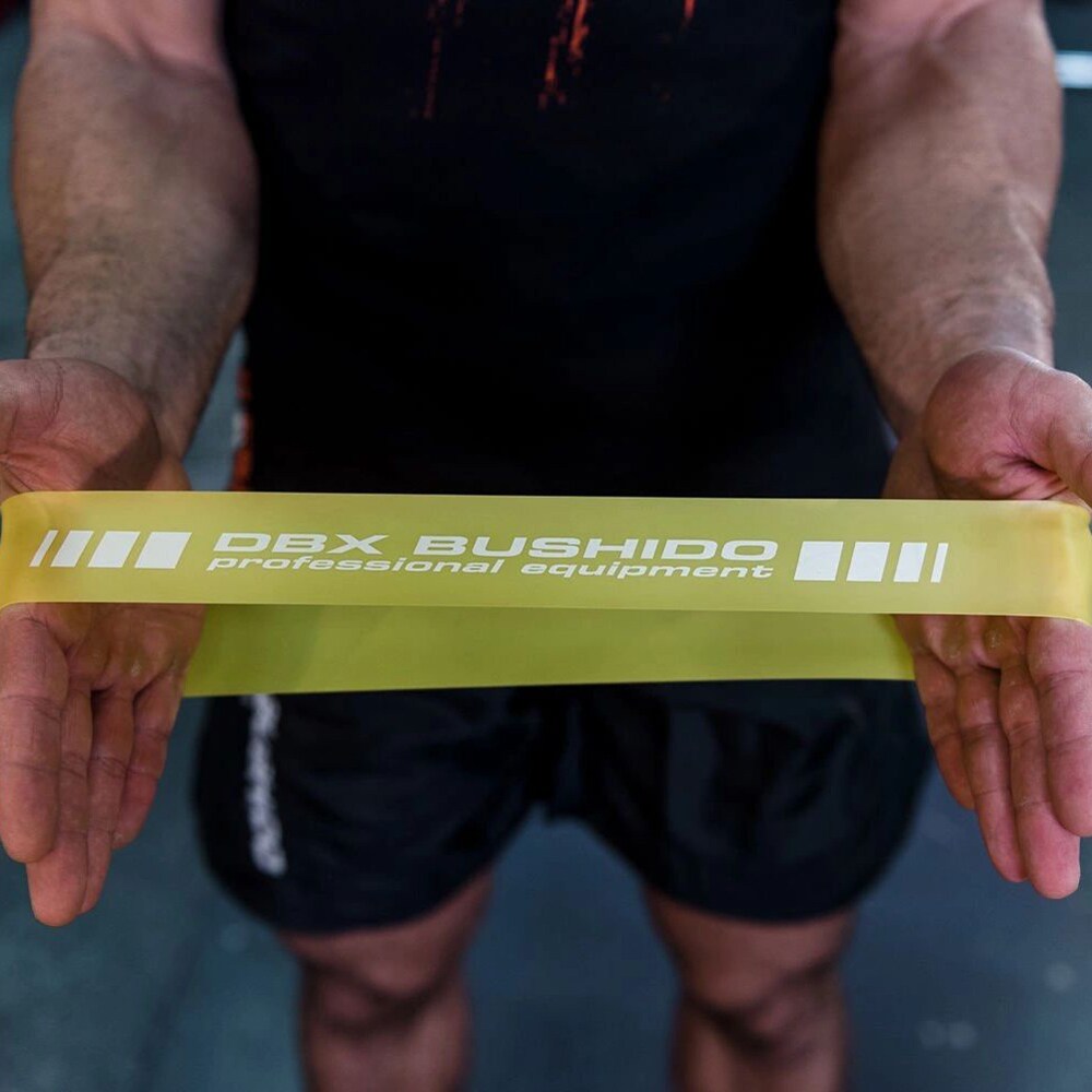 Bandă elastică de rezistență pentru exerciții fizice DBX Bushido 5 - 7 kg - Galbenă
