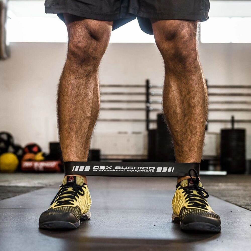 Bandă elastică de rezistență pentru exerciții fizice DBX Bushido 18-25 kg - Neagră