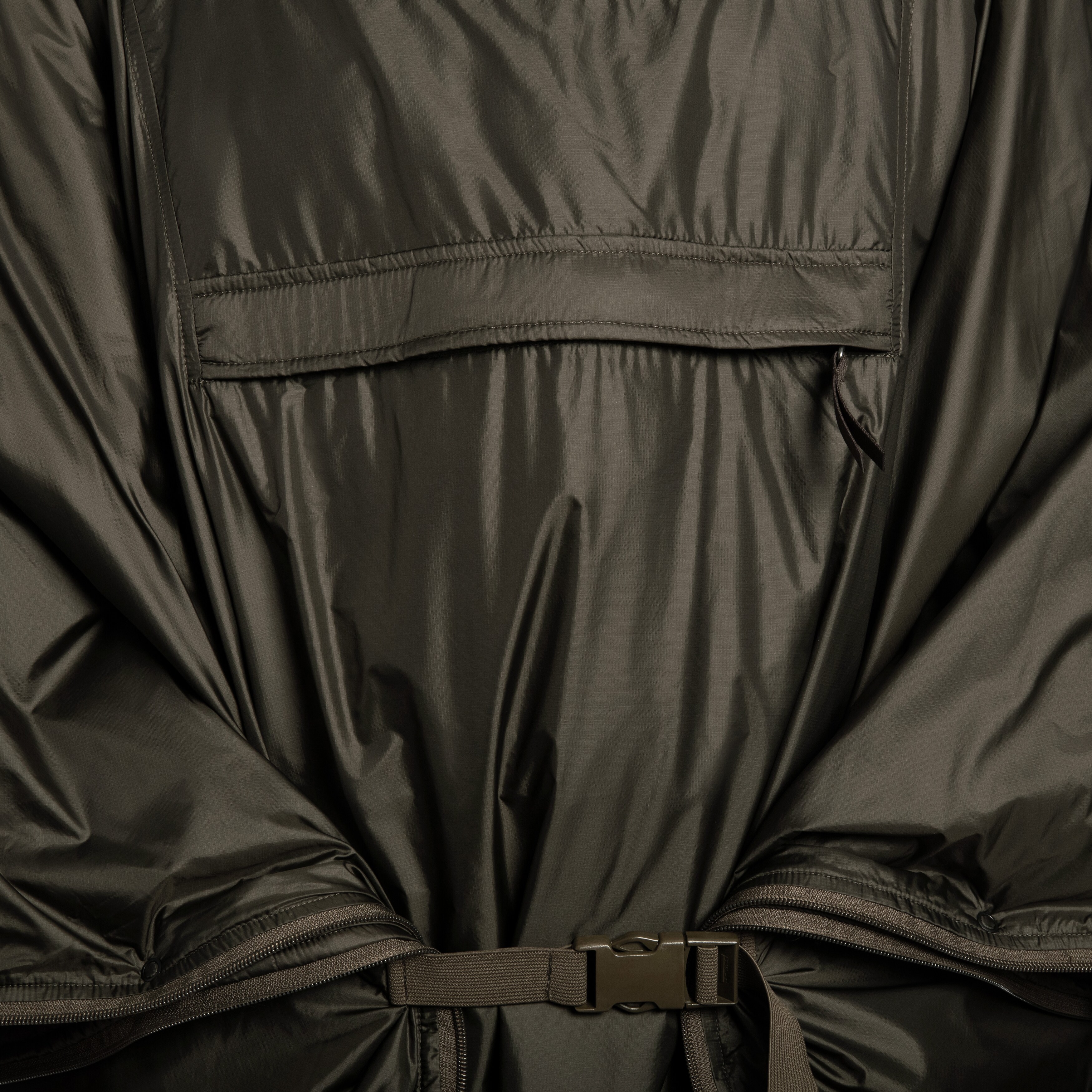 Poncho Carinthia CPS cu funcția de sac de dormit - Olive